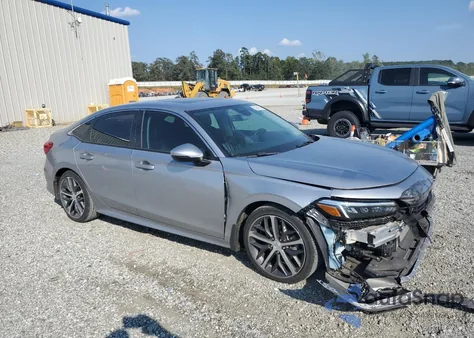 2023 Honda Civic Touring z USA, uszkodzony, nr VIN 2HGFE1F91PH307966